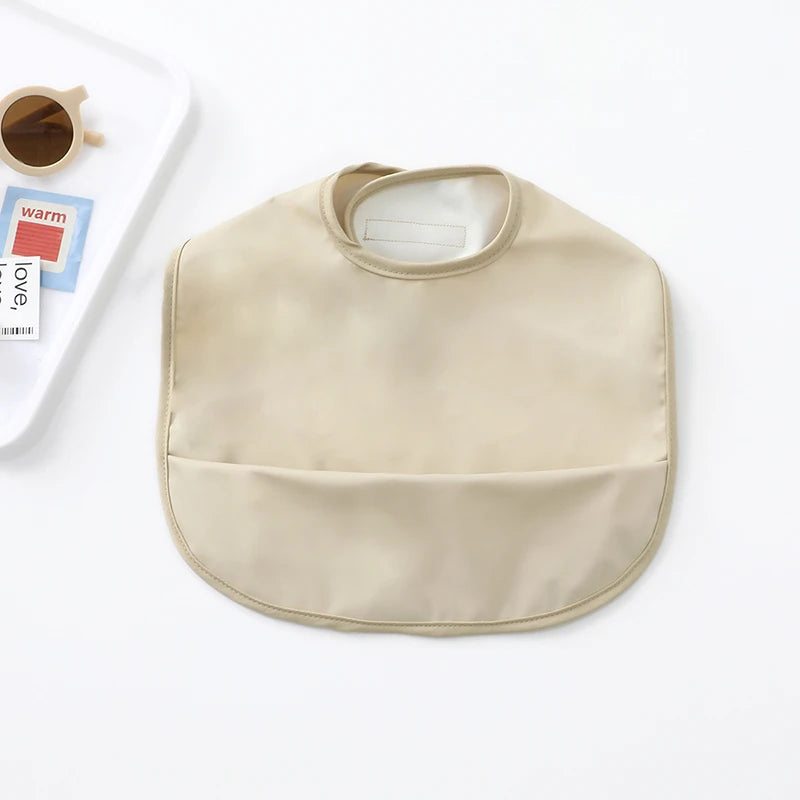 Waterproof Cartoon Baby Bib with Pocket – PU Feeding Apron for Toddlers